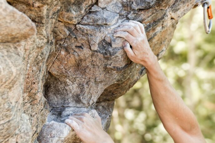 A man climbs a rock wall