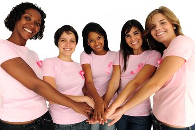 Women touching hand all in pink