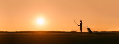 Golfer in the sunset